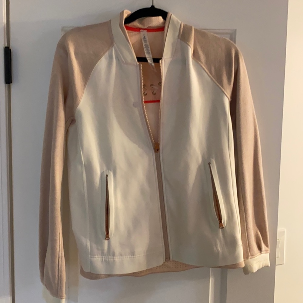 Never worn. Lululemon jacket